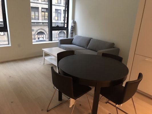 Luxury Gramercy apartment kitted out with IKEA furniture (3 - couch, coffee table, dining table)