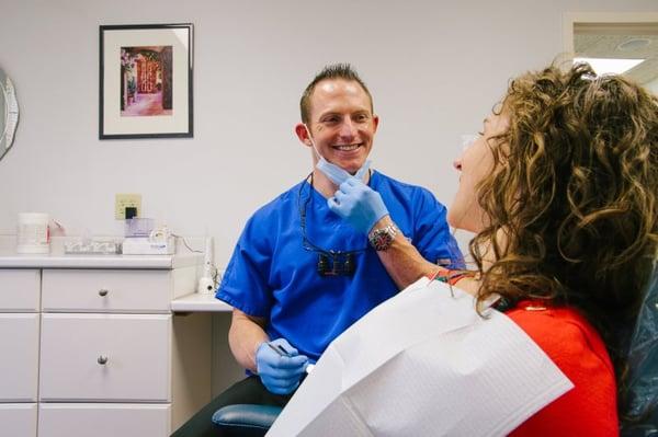 Dr. Morris discussing treatment with a patient.