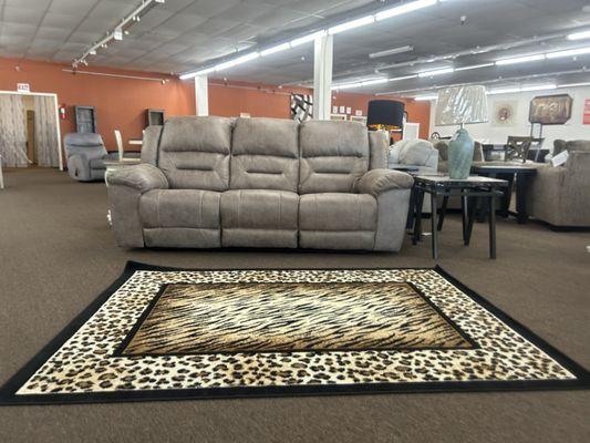 New sectional sofa & exotic animal print area rug