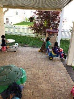 Outdoor play in fenced yard