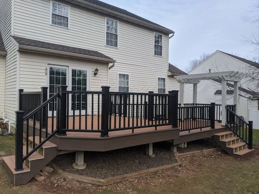 Custom two-tone deck, with radiance rail express railing and timber tech decking!