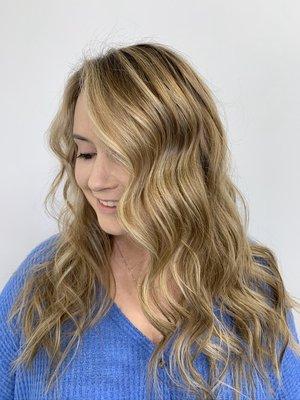 Transitioning from full blonde highlight into a more low-maintenance Balayage look.