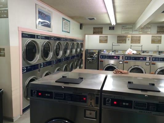 A typical evening of an almost empty laundromat.