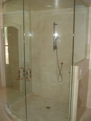 Curved glass shower enclosure, private residence Paradise Valley.