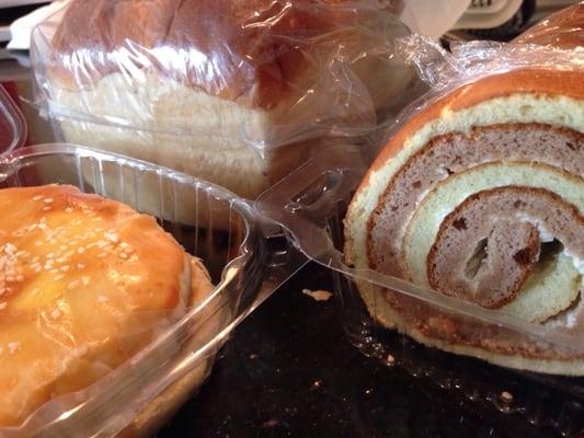 Left to right: wife cake, sweet bread, tiger chocolate roll