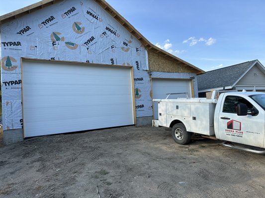 Are you building a home? Contact us at 402-590-5800 for a free estimate! 
Newly installed flush panel design Amarr garage doors!