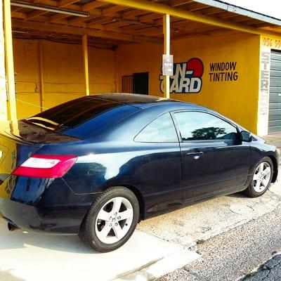 Honda Civic did the window tint light on front & limo dark on back