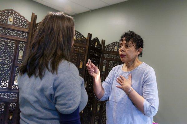 Jennifer Crumpley during a Pranic Healing session in which the aura is strengthened and the chakras are balanced resulting in pain-relief.