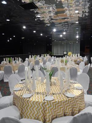 Birthday party using gold chevron and white linens