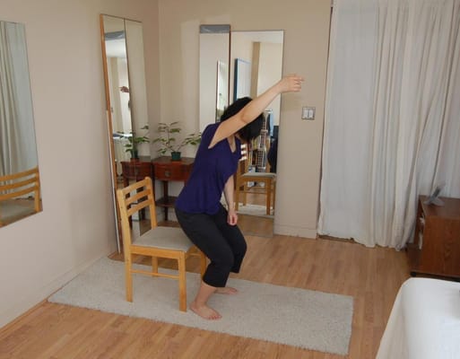 I demonstrate how to get into or out of a chair without collapsing the spine.  Raising an arm overhead is a helpful trick.