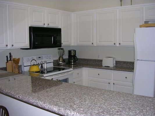 Kitchens for most 1 Bedroom and Two Bedroom homes are this design. Some have been upgraded to new cabinet doors and granite.