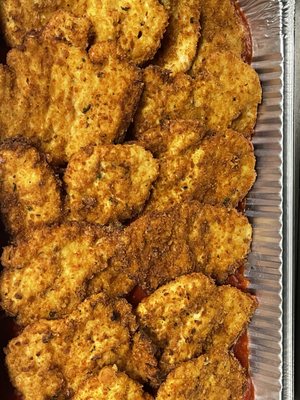 Tray of crispy chicken breast