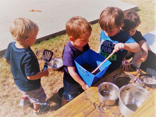 We love to play outside in our mud kitchens!