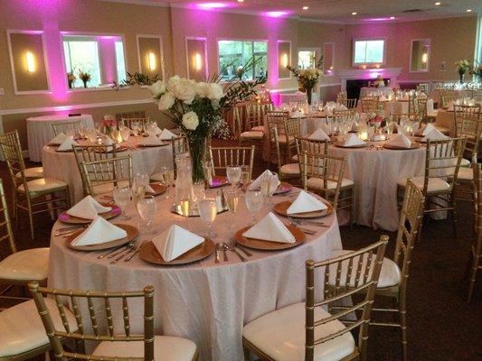 Ballroom set for a Wedding Reception (chairs, up lighting, decor and floor length linen provided by local vendor)