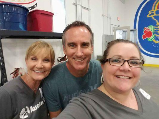 Volunteering with friends at Central Texas Food Bank.