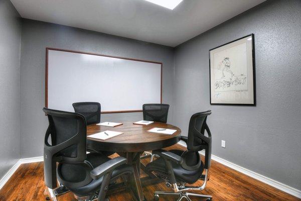 Small conference table in the front house.