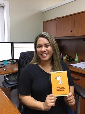 Candice holds a Thank You card from another satisfied eMortgage Hawaii customer!  Way to go #teamemortgaehi!