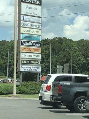 Psychiatry Services of Clarksville sign.  By a fitness center, bakery, two rivers surgical. 243 Dover Rd, across from Rural King.