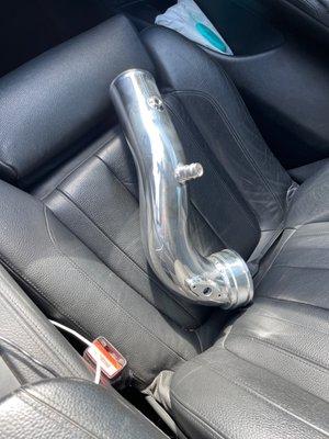 Polished intake / charge pipe for a BMW N55 engine.