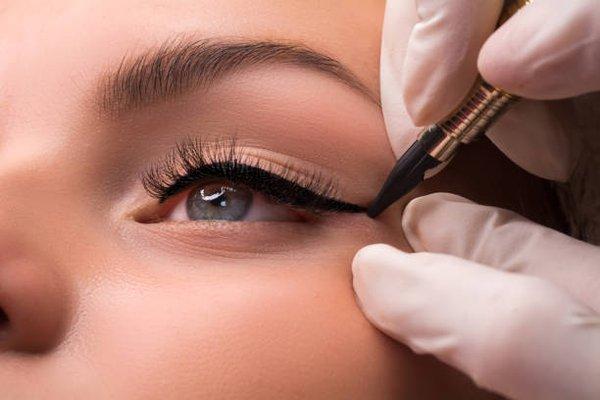 Permanent makeup is a cosmetic technique which employs tattoos as a means of producing designs that resemble makeup, such as eyelining.