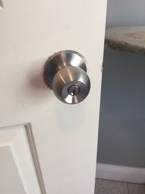 Door handle with key put on laundry room door