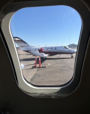 View from Jetit Hondajet window, the plane in the distance is newer not the one they often put us on