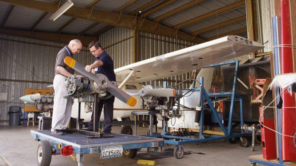 SJVC Fresno - Aviation students learning how to repair aircraft.