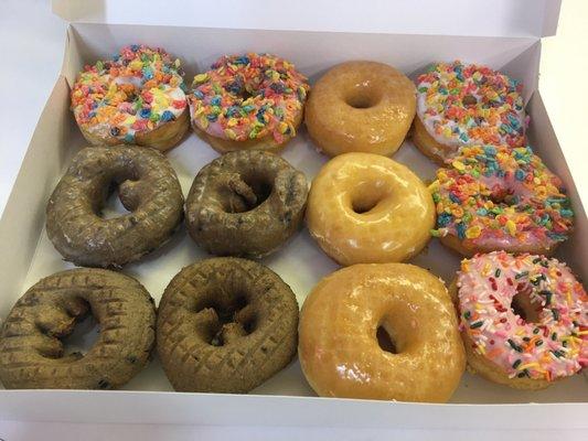 The goods! Glazed, blue berry plain, blueberry glazed, sprinkles, and fruity pebbles??