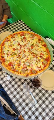 Meat Lover's Pizza With Peppers, Onions, and Extra Cheese