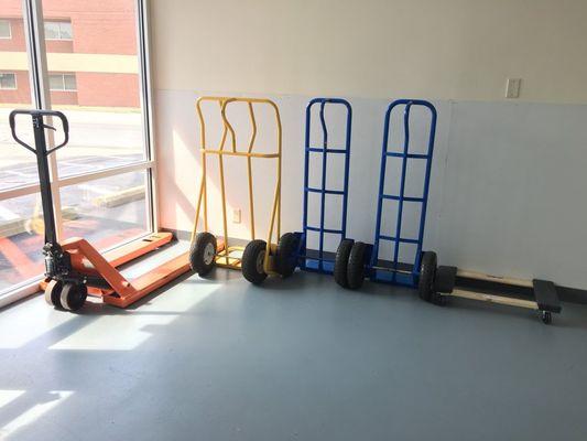 Multiple size/type dollies and pallet jacks freely available for customer use on premise.