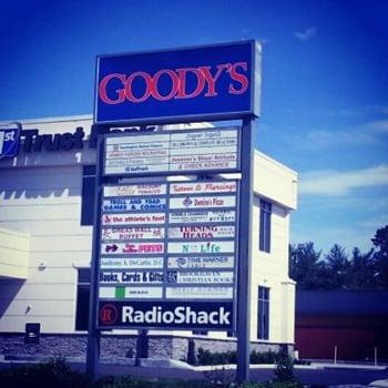 Shopping center sign. We are directly to the left of the sign as your looking at it here! Behind the bank and car wash!