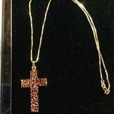 18 K gold cross hand hammered.