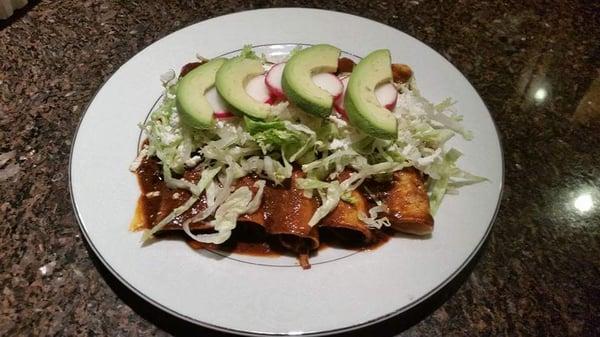 Our famous and delicious enchiladas of mole