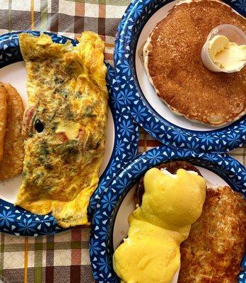 Greek omelette with potato pancake, eggs Benny with cheese hash casserole, chocolate chip pancake