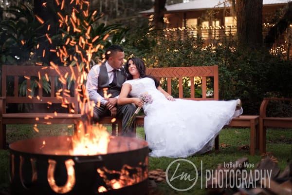 Bride and Groom relaxing by our firepit