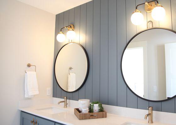 Freshen up your bathroom by easily changing out your light fixtures