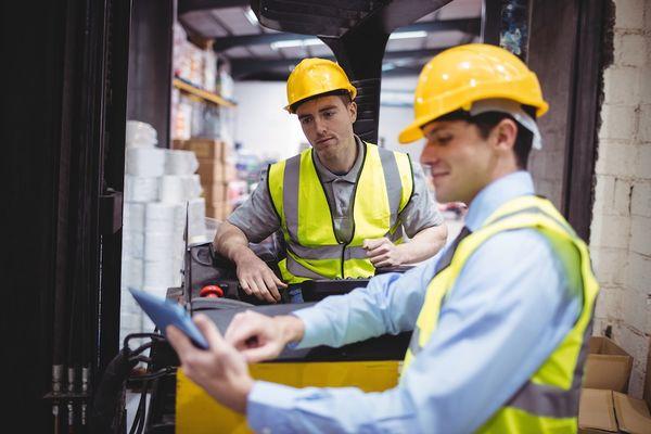 Industrial forklift workers