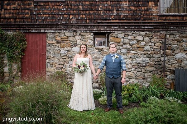 My husband and I on our wedding day. Loved my dress from the cotton bride, dream come true!!