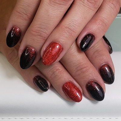 Structured gel manicure with loose glitter accents