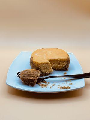 Indulge in our Sweet Potato Pie Cheesecake, a delightful fusion of creamy cheesecake and spiced sweet potato pie. Pure Southern bliss!