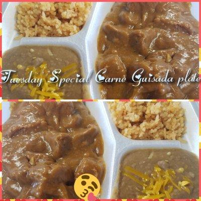 Fat Tuesday tender thick chunks of beef in a homemade gravy served with rice, beans tortillas and teeth