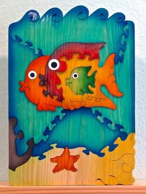 Hand-made eco-friendly children's wooden toy puzzles, keepsake boxes, & picture frames; stained with natural safe water based paints