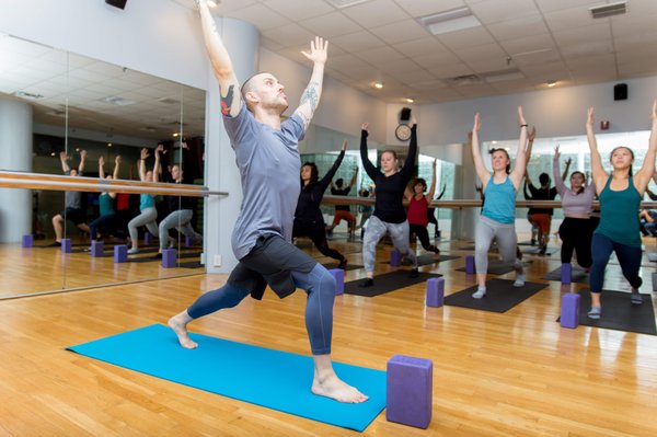 Yoga classes in the gorgeous yoga barre studio at Commonwealth Sports Club