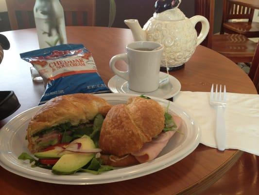 Tantalizing turkey croissant sandwich with jasmine tea ... Very lovely and very fresh organic food, great place!!