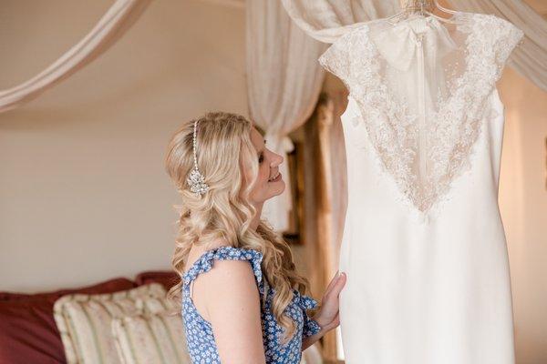 Admiring my wedding dress alterations! Photo by Jennifer of Gilmore Studios in Costa Mesa