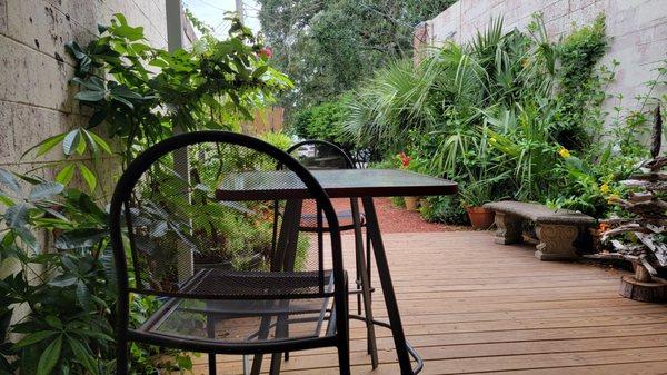 Back patio garden with chairs