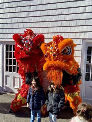 Posing with the Chinese lions