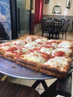 Super fluffy dough.  When I see dough thats this buttery fluffy then I know that pizzeria knows how to make their own dough.