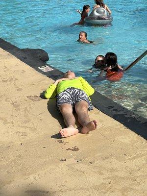 Poolside sleeping in the sun