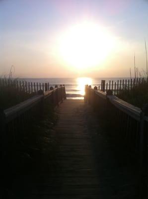 Walkway to beach from hotel. I caught the sunrise on my phone :)